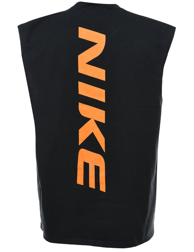 Orange & Black Nike Basketball Vest.  - M