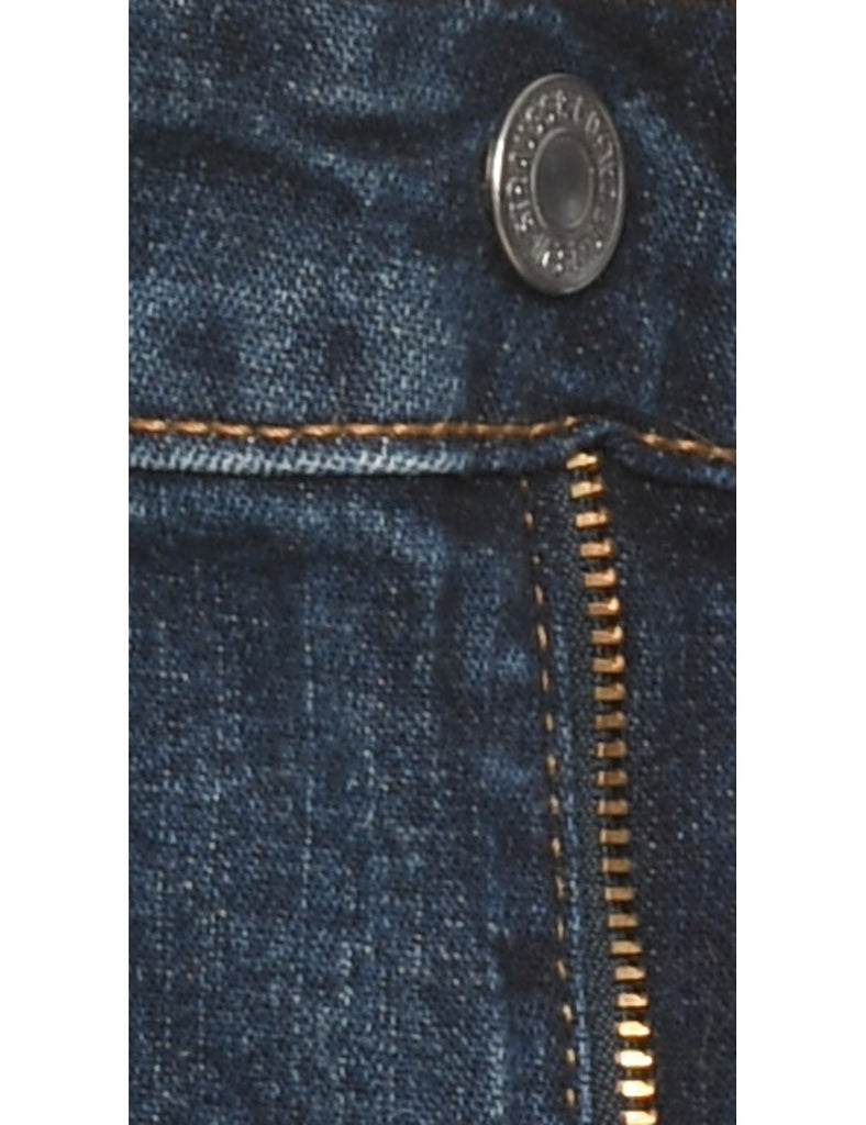 Flared Dark Wash Levi's Jeans - W31 L32